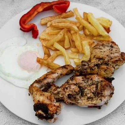 Pollo a la brasa con patatas